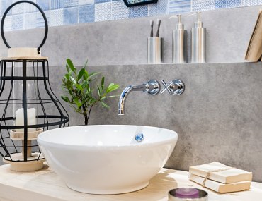 modern bathroom with potted plants and white sink