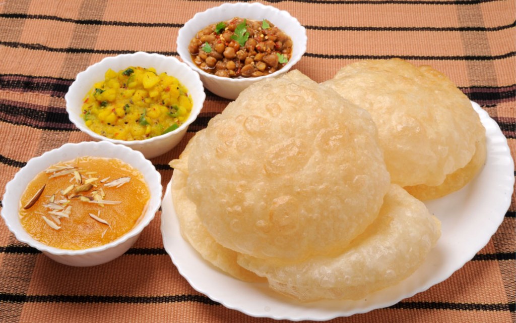 halwa puri is a famous breakfast delicacy in karachi