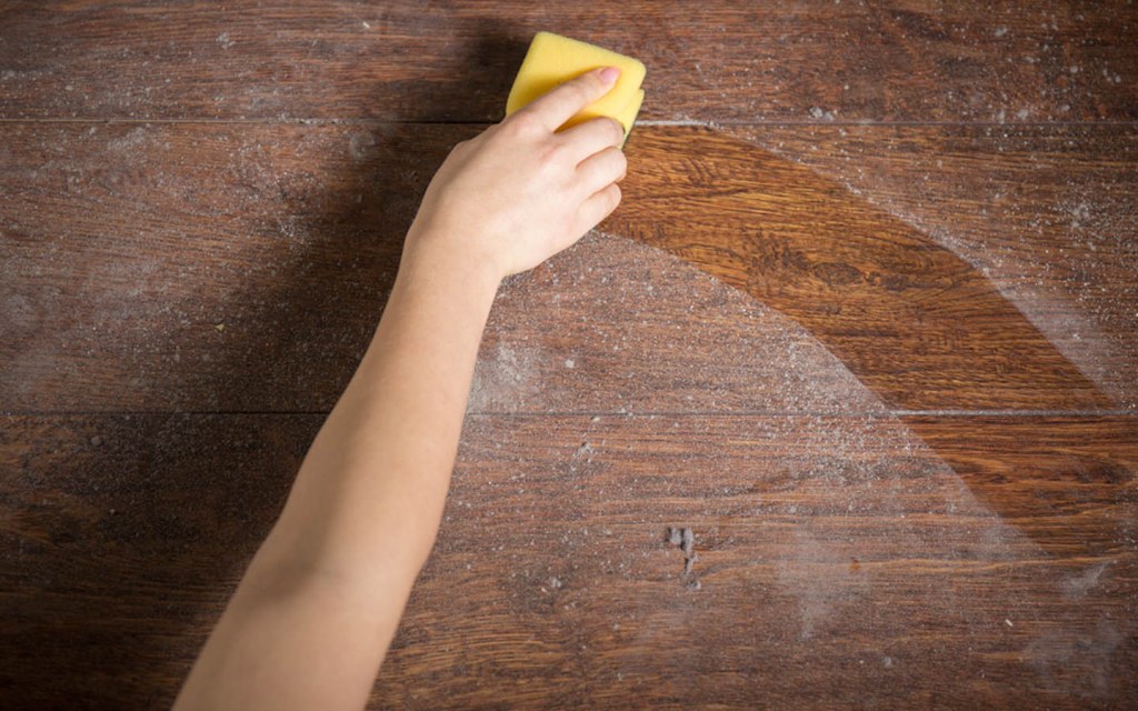 Cleaning dust on table