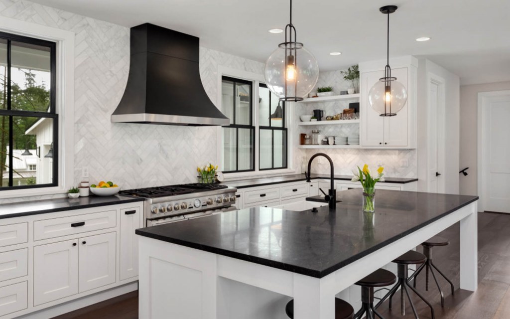 White marble countertops black cabinets