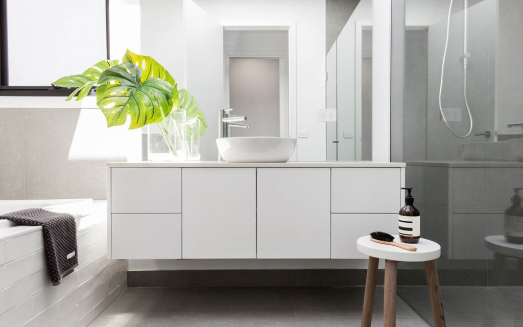 create an expansive look for a smaller bathroom