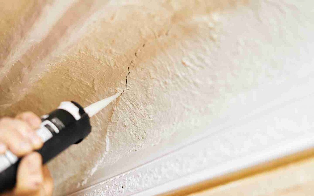 fill any cracks with a caulking sealant