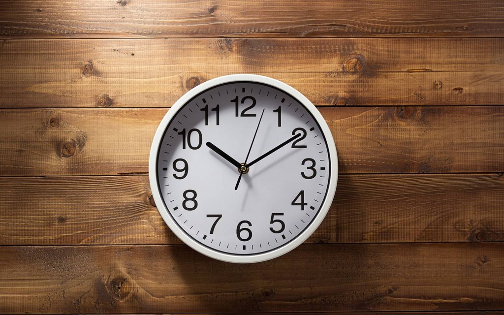 wall clock on a bedroom wall